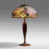 Dogwood table lamp by Tiffany Studios, c. 1910, leaded glass, patinated bronze, sold May 2021