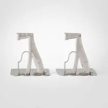Schnauzer bookends, pair by Karl Hagenauer, 1928-1935, nickel-plated brass, sold Jan 2025