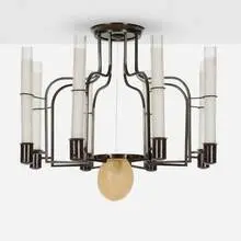 Chandelier by Gilbert Poillerat, c. 1950, patinated iron, frosted glass, ostrich egg, monofilament line, sold Jan 2025