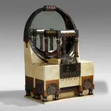 Carlo Bugatti, Cabinet, c. 1900, ebonized wood, walnut, lacquered parchment, brass, pewter, bone, mirrored glass