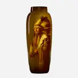 Standard Glaze Native American portrait vase by Grace Young for Rookwood Pottery, 1901, glazed earthenware, sold May 2021