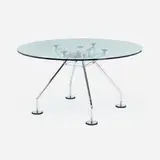 Norman Foster, Nomos dining table, 1987, glass, chrome-plated steel, aluminum, stainless steel, rubber, plastic