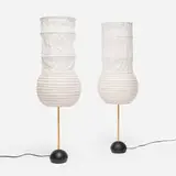 Isamu Noguchi, Akari light sculptures model BB2-S1, pair, washi paper, bamboo, enameled cast iron