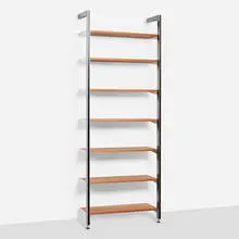 CSS (Comprehensive Storage System) by George Nelson & Associates, 1959, walnut, enameled and brushed aluminum, sold Jan 2025