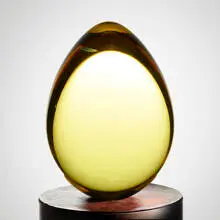Golden Egg II by Christopher Ries, 1987, cut, ground, and polished Cerium-colored optical crystal, sold Jan 2021