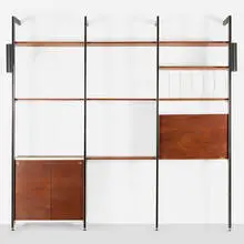 CSS (Comprehensive Shelving System) by George Nelson & Associates, 1959, walnut, enameled and brushed aluminum, enameled steel, sold Jan 2025