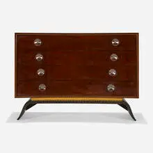 Cabinet from the 3920 series by Gilbert Rohde, 1939, East India laurel, redwood burl, lacquered wood, brass, acrylic, leatherette, sold Dec 2024