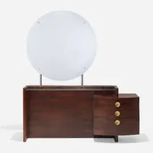 No. 3770 Group vanity by Gilbert Rohde, c. 1940, rosewood, mirrored glass, brass, chrome-plated steel, sold Dec 2024