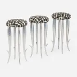 Philippe Starck, Royalton barstools, set of three, 1988, cast aluminum, upholstery