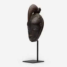 Mask by René Buthaud, c. 1940, glazed earthenware, sold Dec 2024
