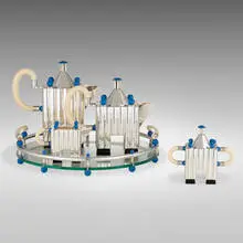 Michael Graves, Piazza four-piece tea and coffee service with tray, 1980 / 1989, sterling silver, glass, plastic, aluminum