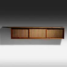 Hanging Wall cabinet by George Nakashima, 1965, American black walnut, pandanus cloth, sold Jan 2021