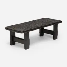 Sculpted coffee table by Modern, c. 1960, sculpted and ebonized oak, sold Dec 2024