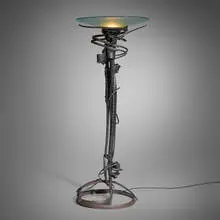 Dragon’s Back floor lamp by Albert Paley, 1992, forged and fabricated steel with a blackened finish, frosted glass, sold Dec 2024
