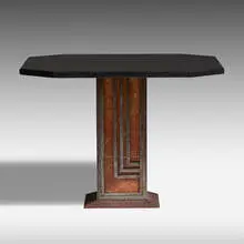 Occasional table by Edgar Brandt, c. 1925, patinated iron, marble, granite, sold Jan 2021