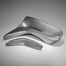 Zaha Hadid, Moon System sofa and ottoman, 2007 / 2010, vinyl upholstery over polyurethane foam