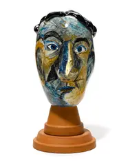 G. Jacobson, Untitled (head of a man), 1979, internally decorated cased glass, black glass and terracotta