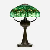 Vine Border table lamp by Tiffany Studios, 1899-1920, patinated bronze, leaded glass, sold Jan 2021