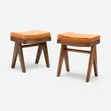 Low stools from the M.L.A. Flats building, Chandigarh, pair by Pierre Jeanneret, c. 1955-56, teak, cane, velvet upholstery, sold Dec 2024