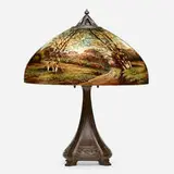 Handel, Table lamp with wooded landscape, 1914, obverse-painted, reverse-painted, and acid-etched glass, patinated metal