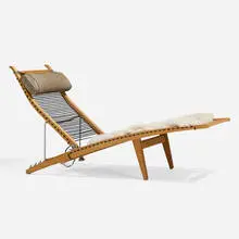 Chaise lounge by Hans J. Wegner, oak, leather, steel, rope, aluminum, shearling, sold Nov 2024