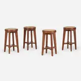 stools from Punjab University, Chandigarh, set of four by Pierre Jeanneret, c. 1965, teak, cane, sold Sep 2020
