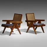 Easy armchairs from Punjab Engineering College, Chandigarh, pair by Pierre Jeanneret, c. 1955, teak, cane, upholstery, sold Sep 2020