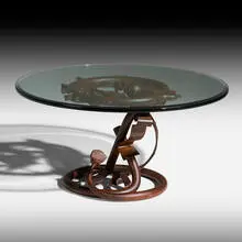 Vortex table by Albert Paley, 2006, formed, fabricated, and forged steel, glass, sold Sep 2020