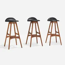Erik Buck, Stools model OD61, set of three, c. 1964, teak, rosewood, leather upholstery