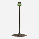 Wild Carrot candlestick by Tiffany Studios, c. 1902, patinated bronze, hand-blown glass, sold Sep 2020