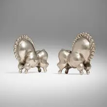Russel Wright, Libbiloo bookends, pair, c. 1930, nickel-plated brass