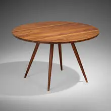 Round Turned-leg table by George Nakashima, 1966, American black walnut, sold Oct 2024