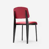 Jean Prouvé, Metropole chair, model 306, c. 1952, lacquered sheet steel, vinyl, aluminum, upholstery