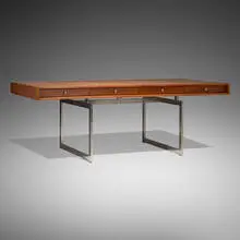 Desk by Bodil Kjær, 1959, rosewood, chrome-plated steel, sold Oct 2024