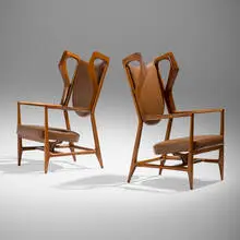 Triennale armchairs, pair by Gio Ponti, 1951, walnut, vinyl, patinated steel tacks, brass, sold Oct 2024