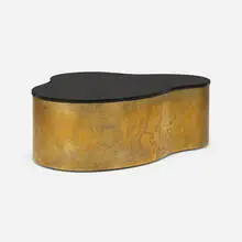 Karl Springer, Free form coffee table, c. 1970, brass, reverse-painted glass