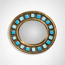 Wall mirror by Mithé Espelt, c. 1965, glazed and gilt earthenware, mirrored glass, sold Oct 2024