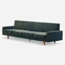 Sofa by Joaquim Tenreiro, c. 1960, jatoba, upholstery, sold Sep 2024