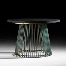 occasional table by Paul Evans and Phillip Lloyd Powell, c. 1960, polychromed and gilt iron and wood, cleft slate, sold Jan 2020