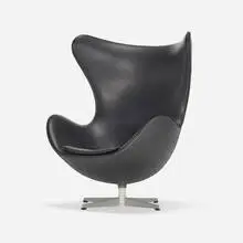 Egg chair by Arne Jacobsen, 1958, leatherette, cast aluminum, molded fiberglass, foam, steel, sold Sep 2024