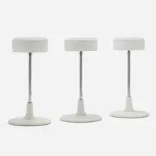 Barstools model 1, set of three by Eileen Gray, leather upholstery, powder-coated aluminum, chrome-plated steel, sold Sep 2024