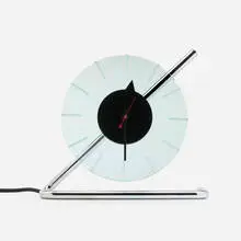 Z-clock, model 4090 by Gilbert Rohde, chrome-plated brass, enameled metal, glass, sold Sep 2024