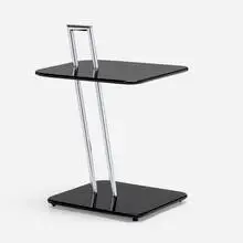 Eileen Gray, Occasional table, chrome-plated steel, lacquered wood