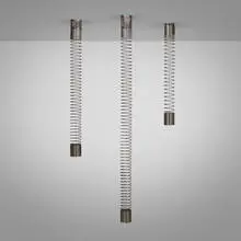 Spiral ceiling lamps, set of three by Angelo Mangiarotti, 1974, chrome-plated steel, sold Sep 2024