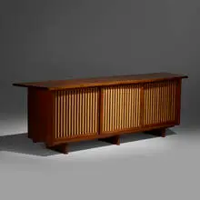 George Nakashima, Triple Sliding Door Cabinet, 1967, American black walnut, pandanus cloth
