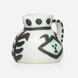 Têtes pitcher by Pablo Picasso, 1956, glazed earthenware with oxidized paraffin decoration, sold Jan 2020