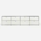 USM Haller Furniture System cabinet by Fritz Haller and Paul Schärer, 1963, lacquered steel, chrome-plated steel, lacquered glass, sold Sep 2024