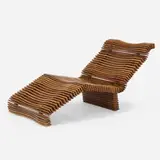 Hawaiian chaise lounge by Pacific Green Furniture, c. 1985, palmwood, rubber, brass, sold Sep 2024