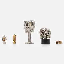 Collection of five puzzle sculptures by Miguel Berrocal, 1969-1979, chrome-plated Zamak, bronze, beryllium bronze, enamel, cubic zirconia, sold Sep 2024