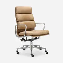 Soft Pad High Back armchair by Charles and Ray Eames, leather, aluminum, enameled steel, sold Sep 2024
